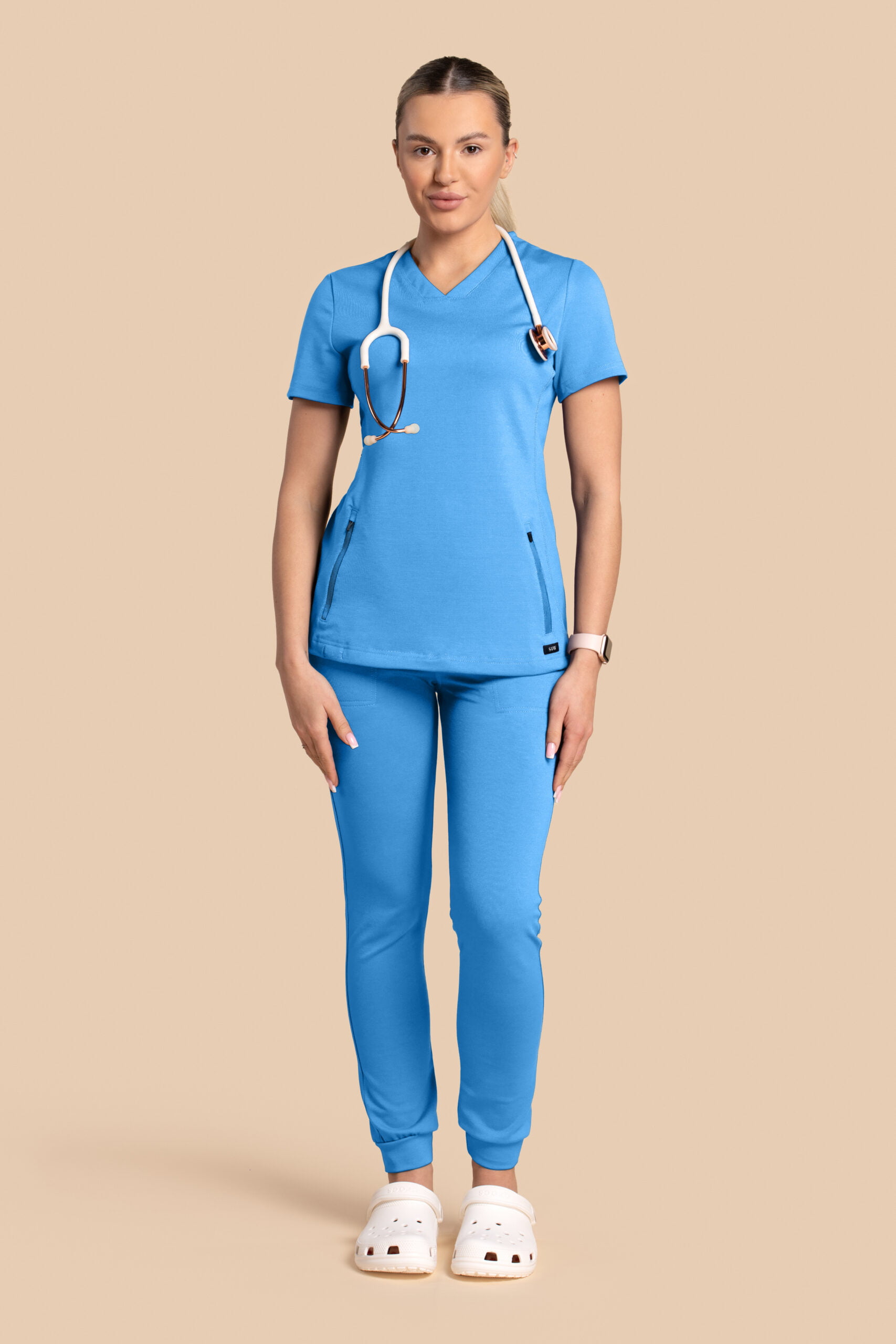 Komplet-medyczny-damski-Scrubs-Twozip-Joggery-Niebieski Komplet scrubs medyczny damski – bluza Twozip + Joggery – niebieski